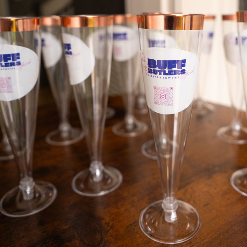 Buff Butlers Official, branded prosecco glasses